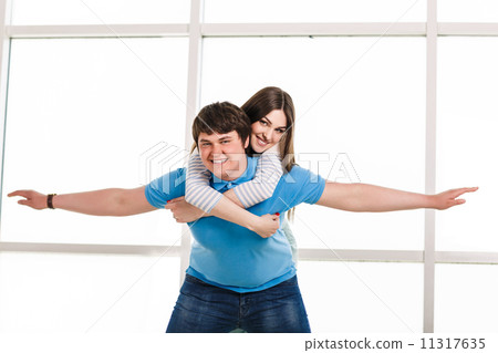 Young playful couple Young playful couple 11317635
