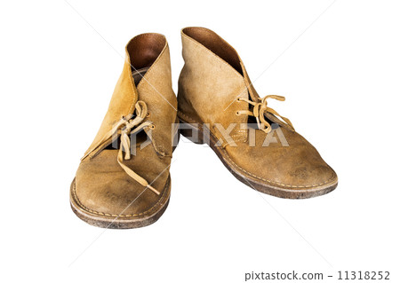 old yellow boots Isolated on white background old yellow boots Isolated on white background 11318252