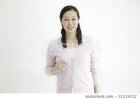 Women in forties refreshing and speechless natural light portrait 11319152