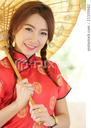 Chinese girl with dress traditional Cheongsam Chinese girl with dress traditional Cheongsam 11320982