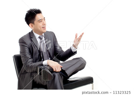 Businessman Sitting and Smiling 11323325