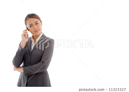 Businesswoman Smiling with Phone 11323327