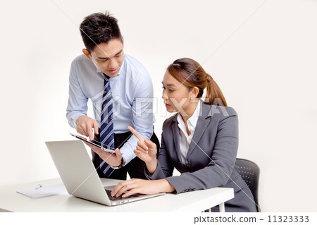 Businessman and Businesswoman with Laptop Businessman and Businesswoman with Laptop 11323333