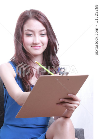 Asian officer women think and note 11325269