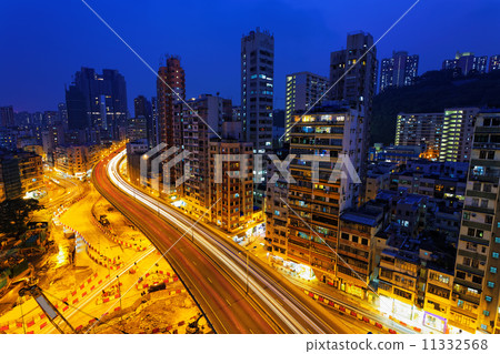Colorful city night with lights of cars motion blurred in hong k 11332568
