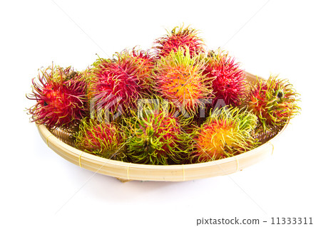Rambutan fruit on basket in white background Rambutan fruit on basket in white background 11333311