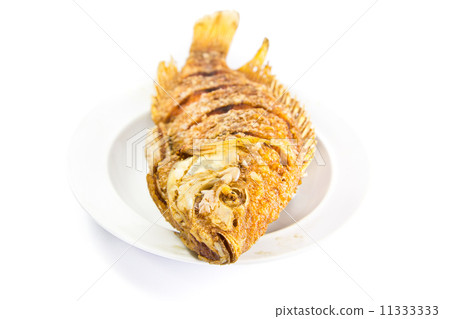 Deep fried fish isolated on white background Deep fried fish isolated on white background 11333333
