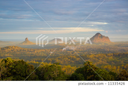 Fading light in the Glasshouse Mountains Fading light in the Glasshouse Mountains 11335426