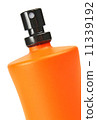 orange small bottle with a perfume liquid 11339192