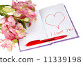 notebook with flowers by a heart and inscription 11339198