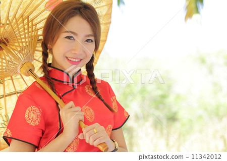 Chinese girl with dress traditional Cheongsam 11342012