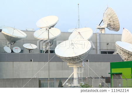 Satellite Communications Dishes on top of TV Station 11342214