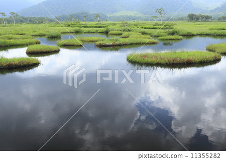 Summer clouds revealing Oze of Ikutan 11355282