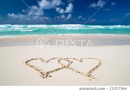 hearts drawn in sand 11357364