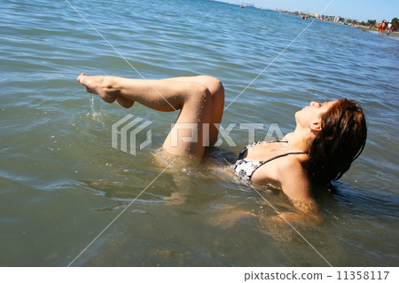 Woman in sea 11358117