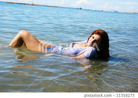 Woman in sea 11358273