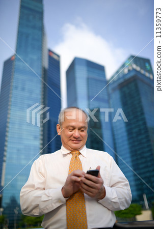 Businessman using phone 11359773