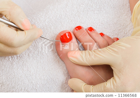pedicure process macro closeup 11366568