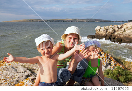 Family on sea coast 11367665