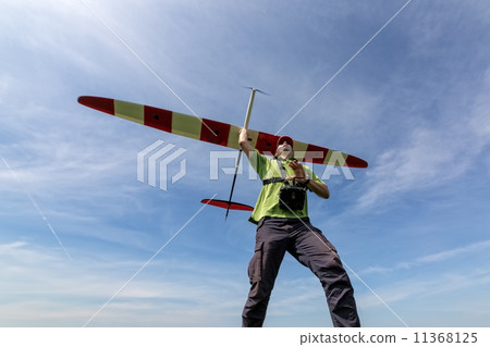 Man launches into the sky RC glider 11368125