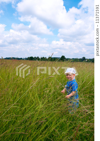 Boy on meadow Boy on meadow 11371591
