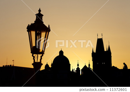 Ancient lamp in Prague against sunrise 11372601