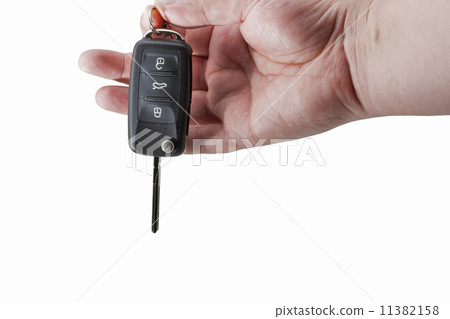 Hand Holding Car Key 11382158