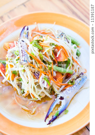 Thai papaya spicy salad on in the the beach restaurant, Som Tum Thai papaya spicy salad on in the the beach restaurant, Som Tum 11391187