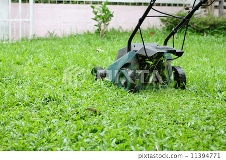 Mower Running in the grass 11394771