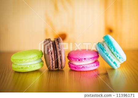 Colorful macaroons, delicious French pastries, on table 11396171