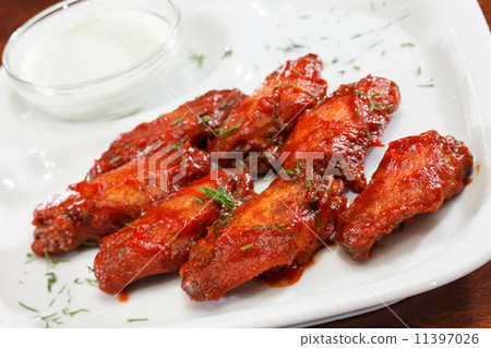 Chicken wings with sauce Chicken wings with sauce 11397026