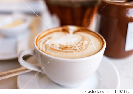 cappuccino with croissants cappuccino with croissants 11397332