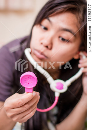 Beautiful young Asian woman Feel good 11398507