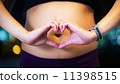 Close up of a cute pregnant belly 11398515