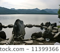 An outdoor bath overlooking the lake 11399366