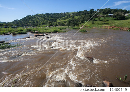 Canoe Race Rapids Action 11400549