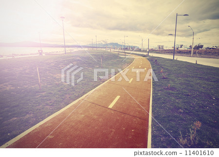 Vintage photo of bicycle lane along the harbour, Puerto Natales, 11401610