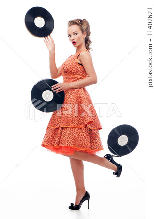 Attractive woman with vinyl disc 11402621