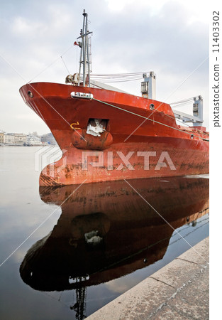 Bulbous bow design detail on moored trader ship 11403302