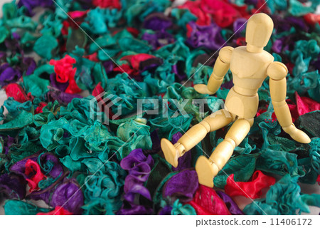 A model doll relaxing to sit on the potpourri A model doll relaxing to sit on the potpourri 11406172