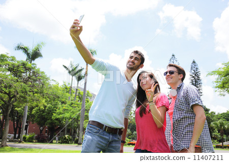 Group of happy friends taking selfie Group of happy friends taking selfie 11407211