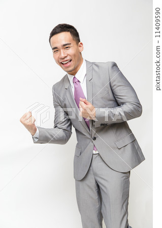 Asian businessman celebrating success 11409590