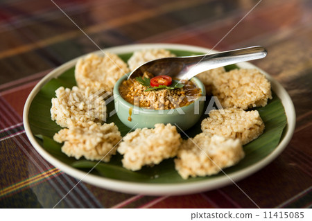 rice crust snack on dish 11415085