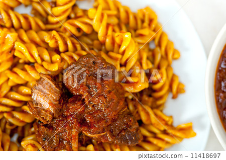 fusilli pasta with neapolitan style ragu meat sauce fusilli pasta with neapolitan style ragu meat sauce 11418697
