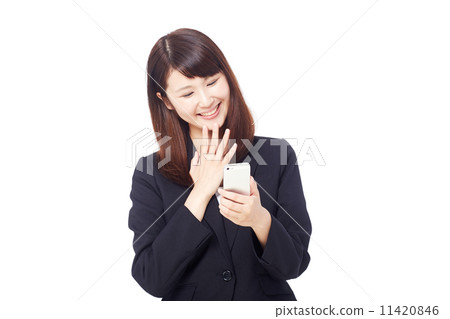 令人愉快的女商人有智能手機 11420846