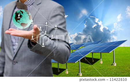 Sustainable energy concept, Solar farm with businessman carry virtual world Sustainable energy concept, Solar farm with businessman carry virtual world 11422810