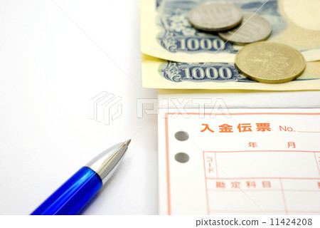 Payment slips, cash and ballpoint pen 11424208