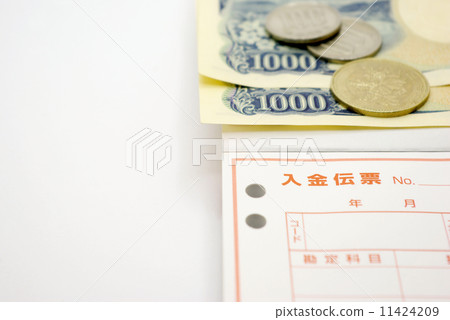Cash slip, cash and copy space 11424209