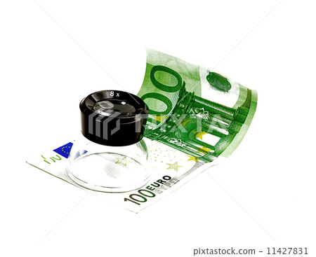one undred euro bill and a lupe 11427831