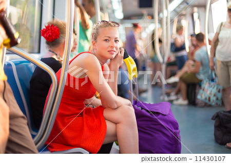 Lady traveling by metro. 11430107